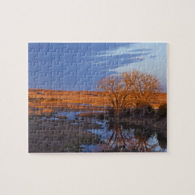 Puzzle Baigné dans la lumière du coucher de soleil, la ri (Horizontal)