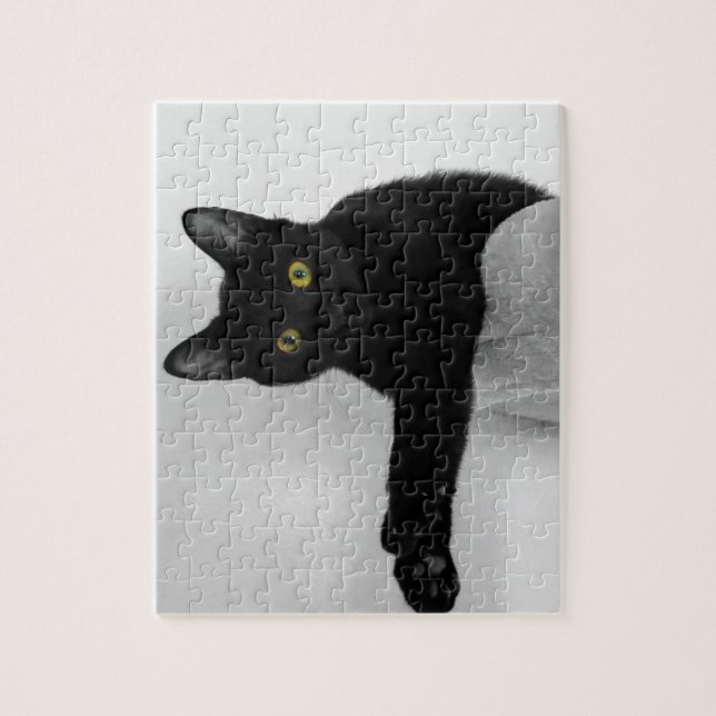 Puzzle Black Cat se détendre sur un canapé (Vertical)