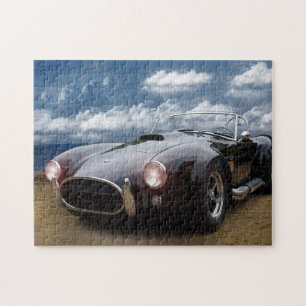 Puzzle Black Cobra sur la plage, voiture classique