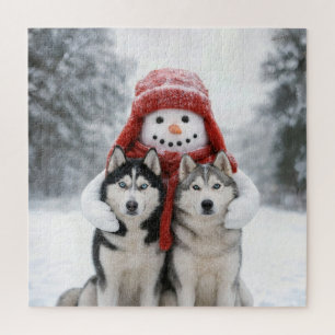 Puzzle Bonhomme de neige étreignant des chiens huskies si