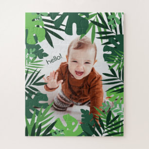 Puzzle bonjour petit garçon dans jungle palme cadre feuil