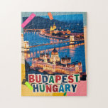 Puzzle Budapest Hungary Night Cityscape Pop Art Collage<br><div class="desc">Budapest Hungary night cityscape showcasing the historic Parliament building and Chain Bridge glowing along the Danube River. This illuminated skyline is reimagined as a pop art collage, blending classic vintage retro travel vibes with mixed media textures to celebrate Eastern Europe travel. Often called the 'Pearl of the Danube, ' this...</div>