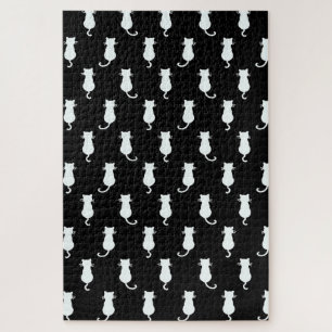 Puzzle Chat blanc isolé sur le Motif noir Polka Dot