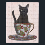 Puzzle Chat noir en Teacup<br><div class="desc">Chat noir en Teacup par FabFunky. Dispose d'un chat assis dans une belle tasse à thé fleurie. | 191544D</div>