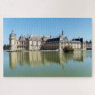 Puzzle Château de Chantilly avec réflexion dans le lac