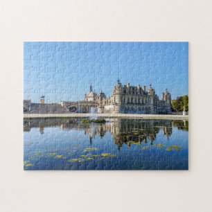 Puzzle Château de Chantilly avec réflexion dans un étang