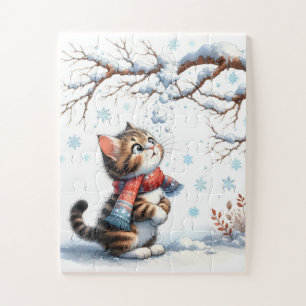 Puzzle Chaton regardant la neige tomber d'une branche