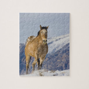 Puzzle Chevaux courant dans la neige