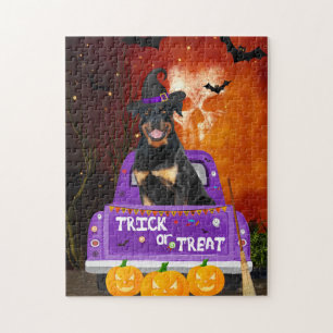 Puzzle Chien Rottweiler dans un camion Halloween