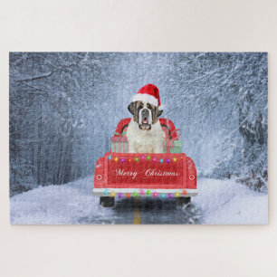 Puzzle Chien Saint-Bernard dans la neige assis dans un ca