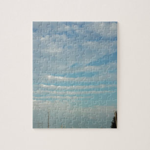 Puzzle ciel bleu avec nuages ondulés