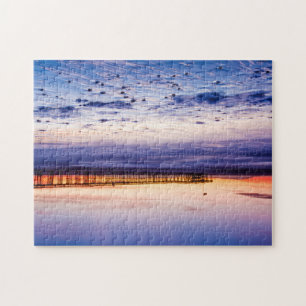 Puzzle Coucher de soleil sur la jetée et la plage de Vent
