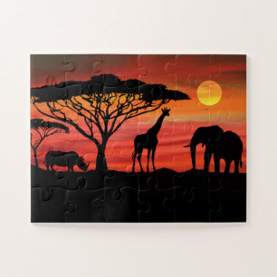 Puzzle Coucher de soleil sur les animaux africains
