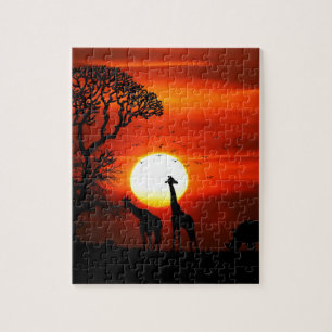 Puzzle Coucher du soleil orange en silhouette de girafe