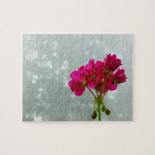 Puzzle de photos en géranium rose