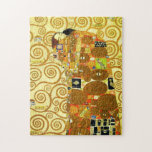 Puzzle de réalisation de Gustav Klimt<br><div class="desc">Puzzle de réalisation de Gustav Klimt. Frise à partir de 1909. Accompli pendant la phase d'or de Klimt, la réalisation comporte un couple d'embrassement se tenant sous un édredon multi-modelé comportant des spirales, des yeux, des oiseaux, des poissons et d'autres formes. L'arrière - plan du travail comporte les mêmes spirales...</div>