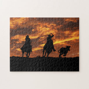 Puzzle Des cowboys au coucher du soleil rustique