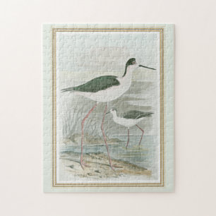 Puzzle Des tiltes noires au bord de l'eau