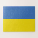 Puzzle Drapeau de l'Ukraine, Ukrainien Слава Україні Slav<br><div class="desc">Les couleurs du drapeau de l'Ukraine, le bleu et le jaune, ont flotté pendant des siècles sur une terre riche en histoire et en esprit. Le bleu représente le vaste ciel ukrainien, tandis que le jaune symbolise les champs de blé dorés qui s'étendent sur ses plaines fertiles. Ce symbole simple...</div>