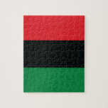 Puzzle Drapeau rouge, noir et vert<br><div class="desc">Les 3 couleurs panafricaines sur le drapeau représentent : le rouge : le sang qui unit tous les peuples d'ascendance africaine noire, et versé pour la libération ; le NOIR : les noirs dont l'existence en tant que nation, bien qu'elle ne soit pas un État-nation, est affirmée par l'existence du...</div>