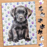 Puzzle Empreintes de pattes de marionnettes du Labrador R<br><div class="desc">Vous cherchez une activité ludique et engageante à partager avec votre famille cette saison des Fêtes? Ne cherchez pas plus loin que notre collection de puzzle avec des Labrador Retrievers ludiques! En tant qu'amoureux des chiens, vous adorerez la variété de modèles que nous offrons, y compris les chiots mignons et...</div>