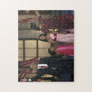 Puzzle famille de Barak Obama fait signe de la main