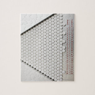 Puzzle Fermer les pilules dans le plateau de tri