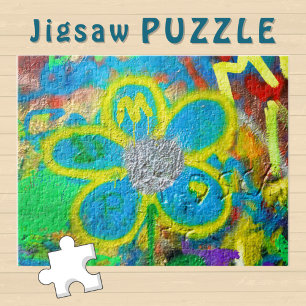 Puzzle Fleur Jaune Turquoise sur un mur de graffitis -