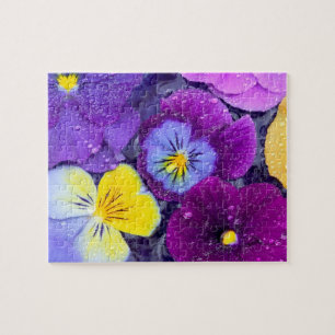 Puzzle Fleurs de pensée flottant dans un bain d'oiseau av