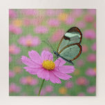 Puzzle Glass Wing Butterfly On a Cosmos Flower<br><div class="desc">A delicate glasswing butterfly with transparent wings gently settles on a vibrant pink cosmos flower,  creating a dreamlike scene enhanced by a soft focus background</div>