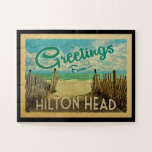 Puzzle Hilton Head Beach Vintage Travel<br><div class="desc">This Greetings From Hilton Head vintage postcard design features a sandy beach with a beautiful turquoise ocean water and above the sea,  a blue sky with billowy white clouds. In vintage travels style.</div>