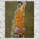 Puzzle Hope II par Gustav Klimt, Art Nouveau Vintage<br><div class="desc">Hope II (1907/08) de Gustav Klimt est une peinture vintage de Symbolisme de l'époque victorienne mettant en scène une femme enceinte qui regarde sur son gros ventre vers un crâne humain. Il y a trois femmes près de ses pieds tissées dans le motif complexe de sa robe. La femme a...</div>