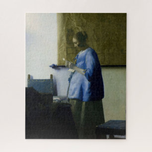 Puzzle Johannes Vermeer - Une femme en bleu lisant une le