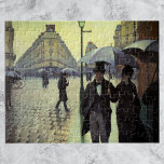 Puzzle Journée de la Pluie de Paris par Gustave Caillebot<br><div class="desc">Paris Street, Rainy Day (alias Paris : A Rainy Day) (1877) de Gustave Caillebotte est un impressionnisme vintage de beaux-arts peinture urbaine. Un carrefour pavé près de la Gare Saint-Lazare, une gare du nord de Paris, France. Les gens marchent sous la pluie tenant des parapluies dans la ville. À propos...</div>