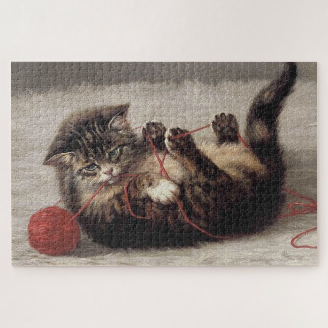Puzzle Le berceau de chat, un chat qui joue à la balle de (Horizontal)