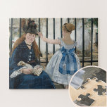 Puzzle Le Chemin de fer par Eduard Manet, Art<br><div class="desc">Le tableau fait référence à la gare Saint-Lazare, la gare la plus grande et la plus animée de Paris en 1873, inédite dans ce tableau. Confinés dans un espace étroit soutenu par les barres noires d'une clôture en fer et isolés par des nuages de vapeur envoyés par un train passant...</div>