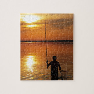 Puzzle Le pêcheur pêche des poissons par la rotation