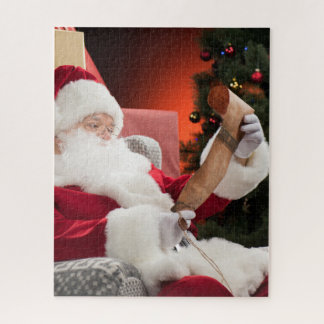 Puzzle Le Père Noël vérifie son énigme de liste