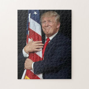 Puzzle Le président Trump étreignant le drapeau américain