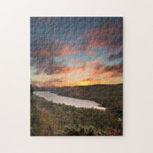 Puzzle Lever de soleil vibrant sur le lac des nuages en a