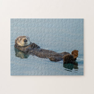 Puzzle Loutre de mer flottant sur le dos dans l'océan