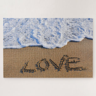 Puzzle Love into the sand written