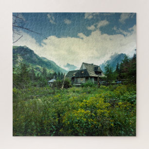 Puzzle Maison en bois, paysage de montagne.