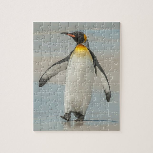 Puzzle Manchot empereur marchant sur la plage (Vertical)