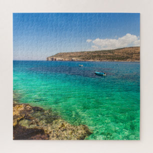 Puzzle mer avec petit bateau de pêcheur