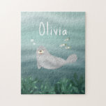 Puzzle Mignonne sous la mer Blue Ocean Seal Enfants<br><div class="desc">Ce mignon puzzle pour enfants présente une illustration de phoque de l'océan avec du poisson, des algues et un arrière - plan à vague bleue. Il y a aussi de l'espace sur le puzzle pour ajouter votre propre personnalisation : un nom dans la typographie lunatique. Le cadeau parfait sous le...</div>