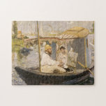 Puzzle Monet Peinture dans son Studio Boat | Édouard Mane<br><div class="desc">Claude Monet Painting in His Studio Boat (1874) d'Édouard Manet est une peinture vintage fascinante qui capture le moment intime et créatif de Monet au travail. Le chef-d'oeuvre de l'art met en scène le célèbre artiste impressionniste Monet, peignant sur son bateau en flottant doucement sur l'eau. Le brossage habile de...</div>