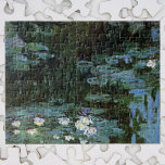 Puzzle Nénuphars de Claude Monet, Art Vintage<br><div class="desc">Nénuphars by Claude Monet est une vintage impressionnisme de peinture de la nature d'art fine mettant en scène des nénuphars dans un étang dans le jardin de Monet chez lui à Giverny, France. Les saules qui pleuvent jettent un reflet dans l'étang. Claude Monet aimait peindre "en plein air" ou "en...</div>