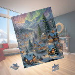 Puzzle Noël dans un village de montagne, lumières polaire<br><div class="desc">Ce Puzzle présente un village enneigé avec des maisons lumineuses dans les montagnes,  entourées de grands sapins,  des lumières polaires brillant dans le ciel. Merveilleuse idée cadeau!</div>