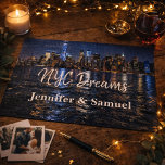 Puzzle NYC Dreams Romantic Skyline Couples Keepsake<br><div class="desc">Celebrate love with a beautiful keepsake inspired by the magic of New York City. This elegant NYC Dreams skyline puzzle captures the glowing Manhattan skyline reflecting across the water, creating a romantic and timeless scene. Personalized with names, this puzzle becomes more than just a fun activity—it becomes a meaningful keepsake...</div>